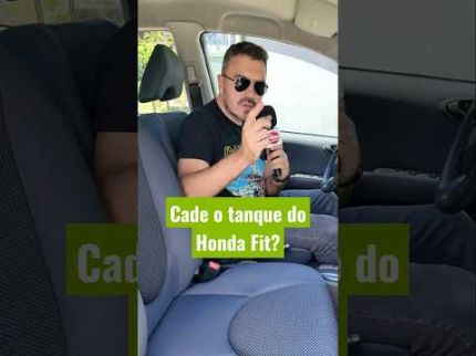 Onde fica o tanque do Honda Fit?